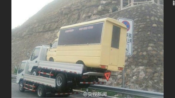 GENIUS IDEA TO TRANSPORT THREE TRUCKS TURNS SOUR china three trucks