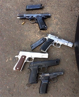 Five BMW hijackers nabbed with gun stash guns