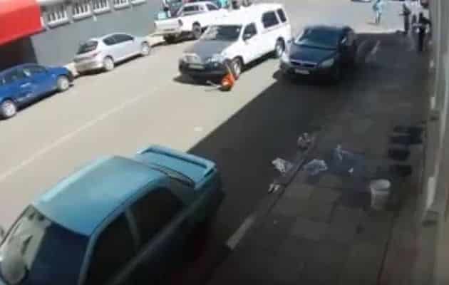 WATCH: Car drags woman down street in shocking hit-and-run womanbumped