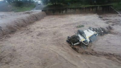 Watch: Miraculous escape as taxi is swept off flooded bridge in KZN unnamed e1573771574735