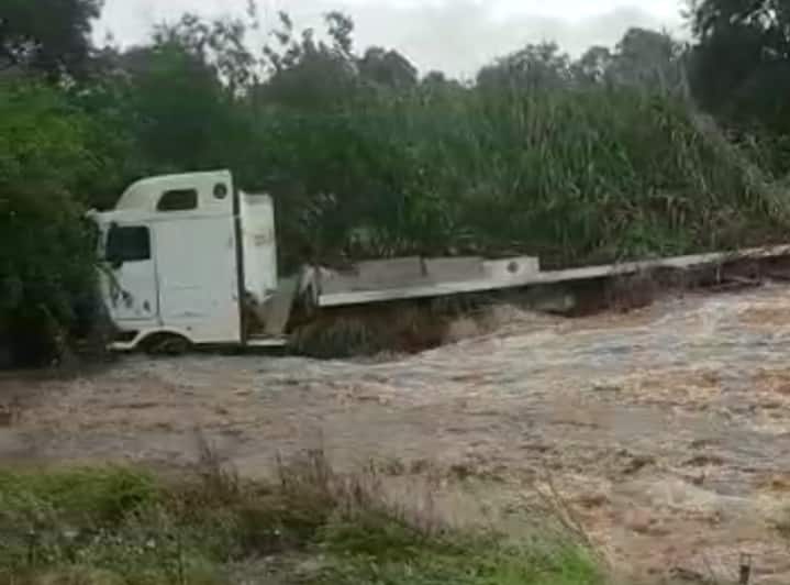Watch: Truck swept off flooded bridge 20191209 165626