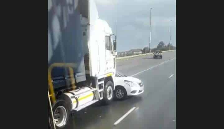 Horrifying moment truck filmed pushing a car on highway seemingly unbeknown to the trucker Screenshot 20210916 072634 CapCut