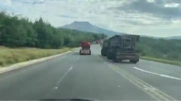   Watch: Reckless, speeding truck driver dangerously overtakes causes crash and speeds off