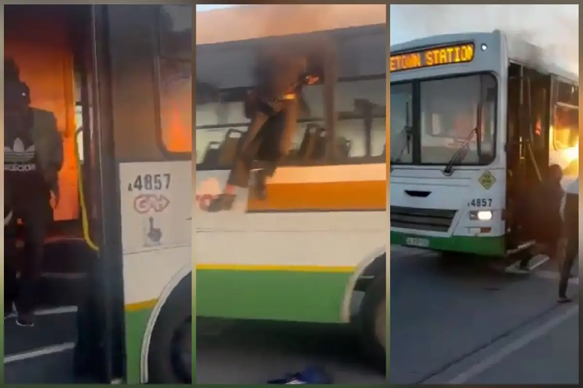 Passengers escape from burning bus petrol-bombed in the Cape Town taxi strike