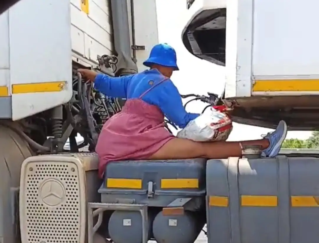 Gogo riding on a truck