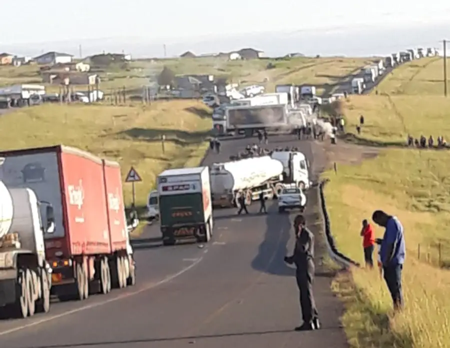 Protesting community members have hijacked trucks and used them to block the N2 between Dutywa and Butterworth in the Eastern Cape on Thursday morning.Mbhashe